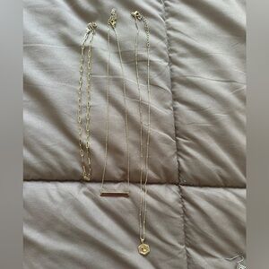 Stackable gold necklaces: L for longest, flat bar for middle, chain for shortest
